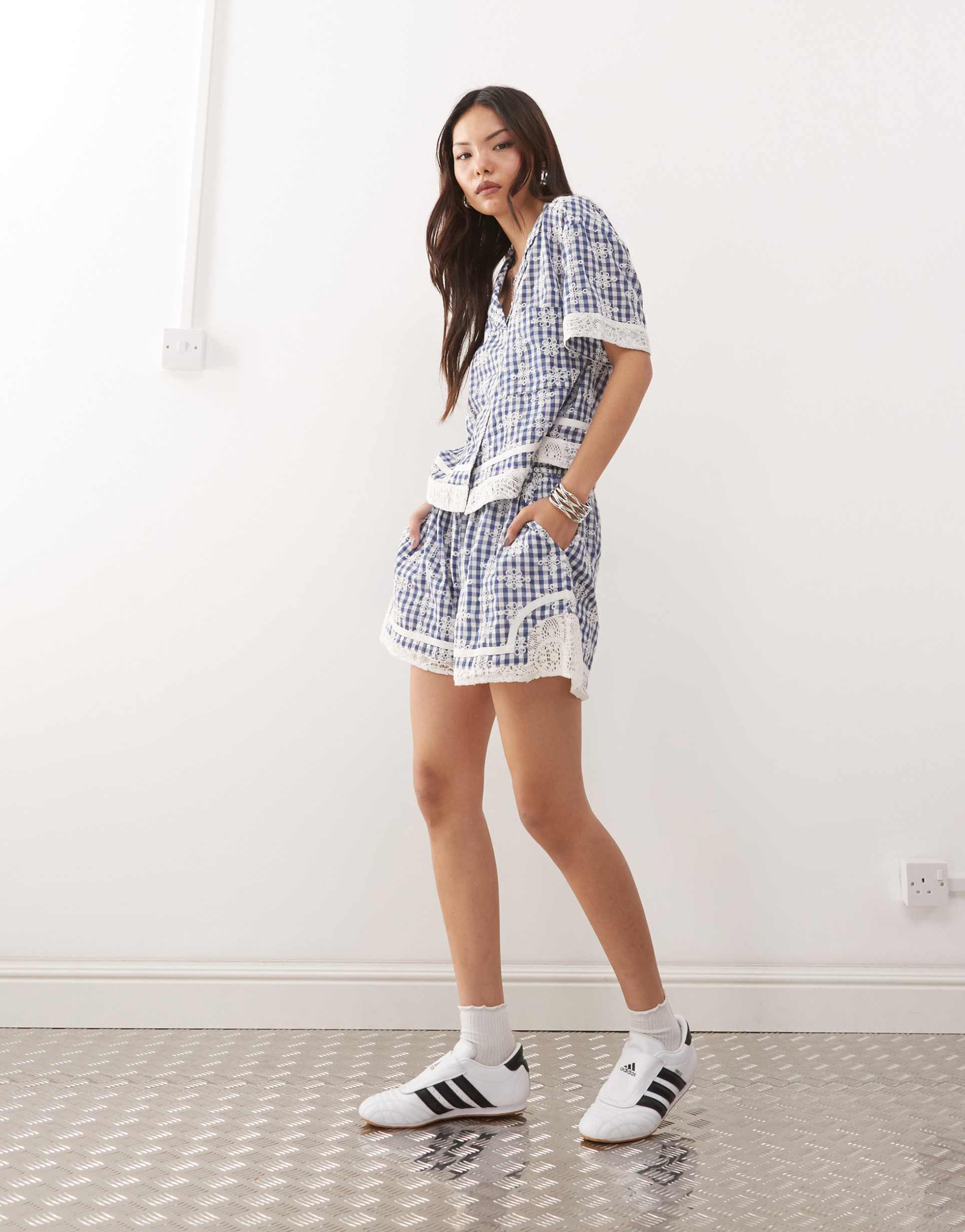 reclaimed vintage festival pull on boxy shorts with crochet trim in blue gingham