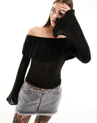 fine knit off shoulder top with flute sleeves in black