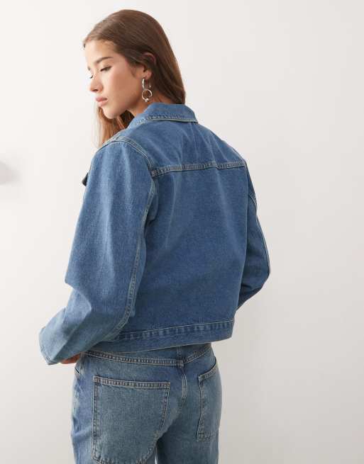 Reclaimed Vintage fitted denim jacket in mid blue wash 