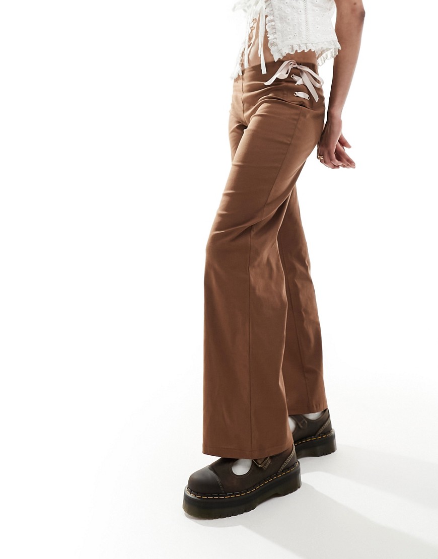 Reclaimed Vintage flare trouser in brown with pink bows & ribbon