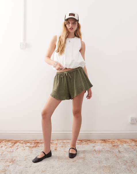 Reclaimed Vintage flippy pull on shorts in textured green - view 1