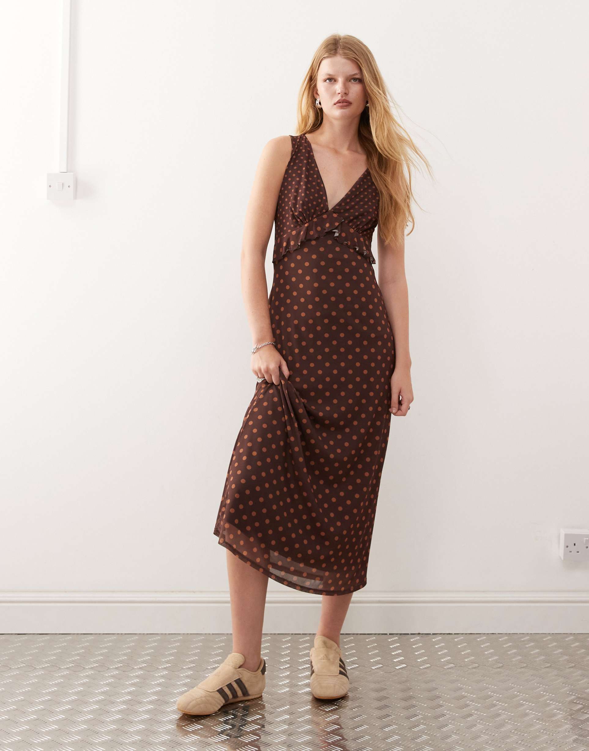 reclaimed vintage floaty midi dress with ruffle detail in mixed brown and pink polka dot print