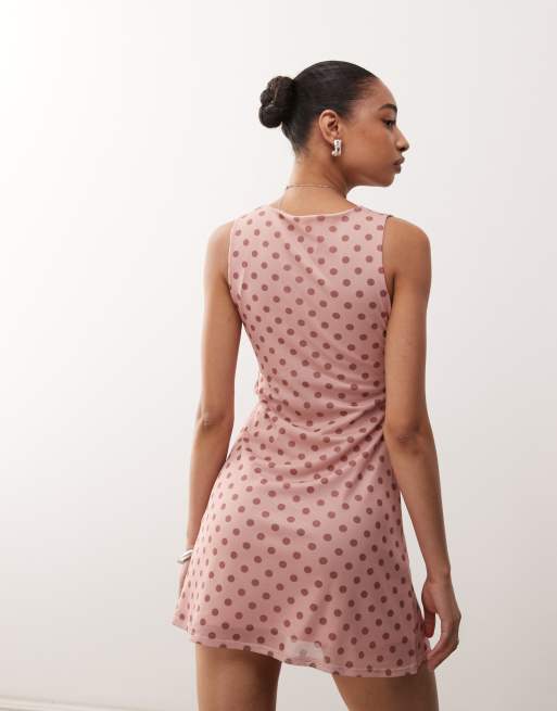Reclaimed Vintage floaty mini dress with frill detail in mixed pink polka dot print