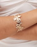 [Reclaimed Vintage] Reclaimed Vintage flower bangle in gold One Size Gold