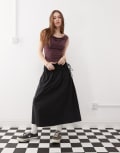 [Reclaimed Vintage] Reclaimed Vintage full poplin midi skirt with tie sides in black 10 black