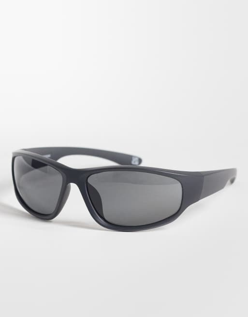 Reclaimed Vintage - Gafas de sol negras unisex de estilo deportivo envolvente, 1 de 3