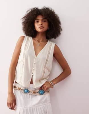 Reclaimed Vintage - Gilet color crema con inserti in pizzo