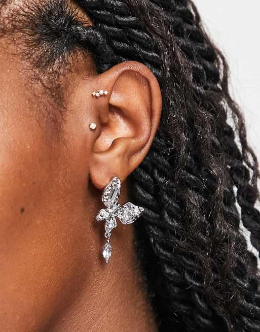 Reclaimed Vintage grunge butterfly earrings in silver
