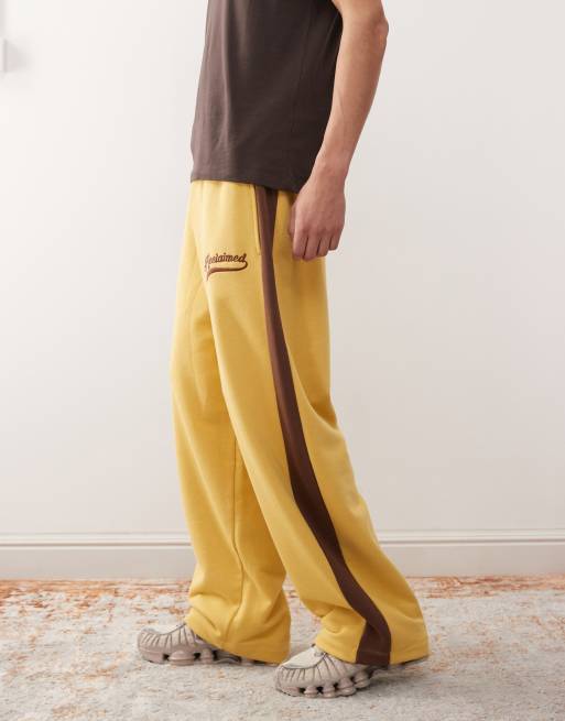 Reclaimed Vintage heavyweight wide leg jogger in mustard with brown side stripe