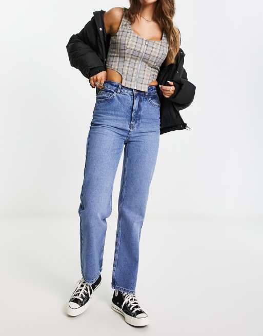 Reclaimed Vintage high waist slim leg jeans in washed blue