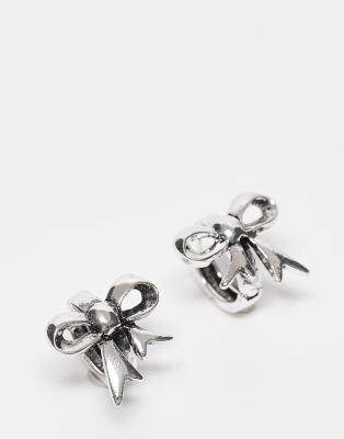 Reclaimed Vintage huggie hoops with bows in burnished silver