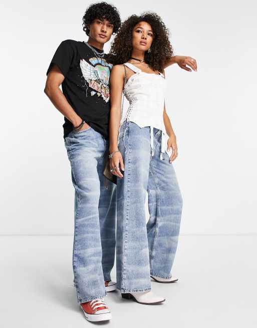 Reclaimed Vintage Inspired 00s unisex baggy jeans in heavy distress wash