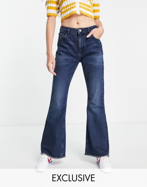 Reclaimed Vintage inspired 86' wide flare in mid blue wash