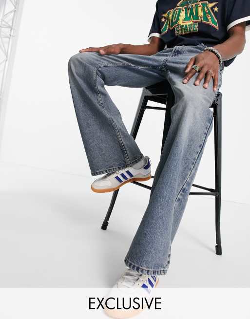 Reclaimed Vintage Inspired 90s relaxed flares in mid wash blue