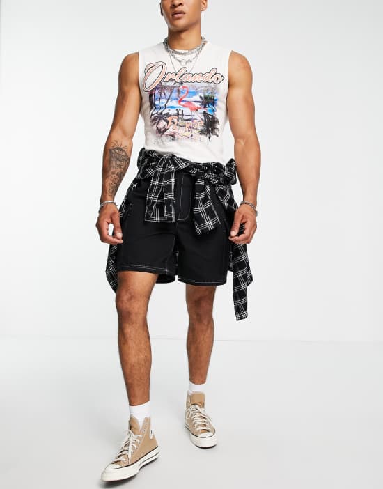 https://images.asos-media.com/products/reclaimed-vintage-inspired-baggy-black-shorts-with-white-contrast-stitch/202733980-3?$n_550w$&wid=550&fit=constrain