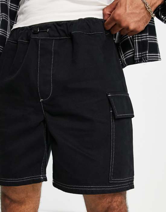 https://images.asos-media.com/products/reclaimed-vintage-inspired-baggy-black-shorts-with-white-contrast-stitch/202733980-4?$n_550w$&wid=550&fit=constrain