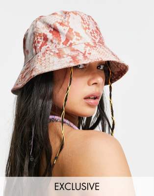 Reclaimed Vintage inspired bucket hat in pink snake print
