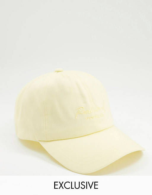 Reclaimed Vintage inspired cap with script logo embroidery in pastel yellow