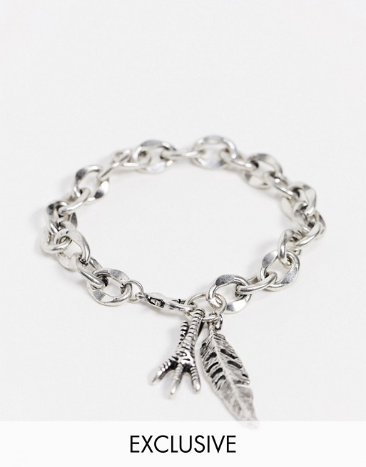 Reclaimed Vintage inspired chain bracelet with feather charm in silver