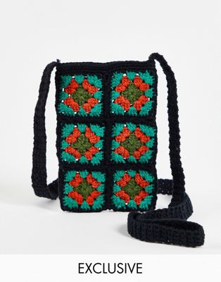 Reclaimed Vintage inspired crochet phone pouch in black and orange
