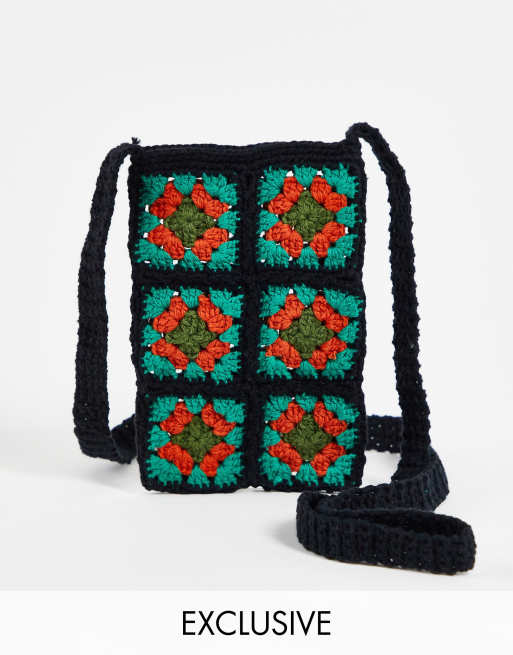 Reclaimed Vintage Inspired crochet phone pouch in black and orange 