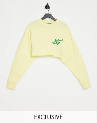 Reclaimed Vintage inspired crop sweat with logo in yellow | ASOS