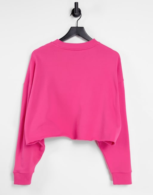 Neon pink cropped sweatshirt store