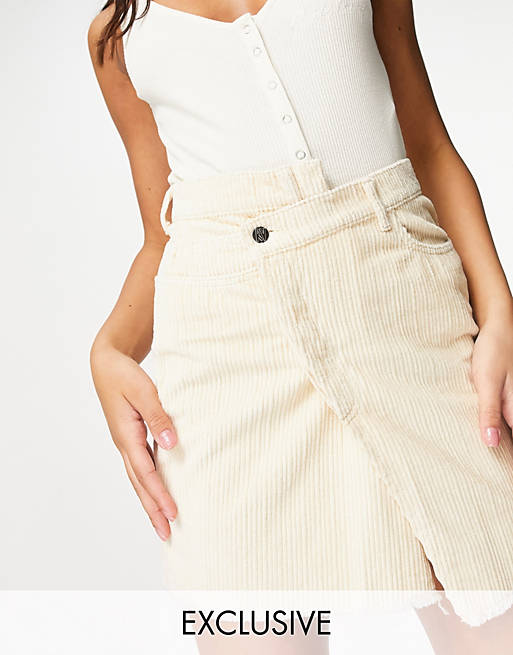 Reclaimed Vintage inspired cross over waistband mini skirt in ecru cord