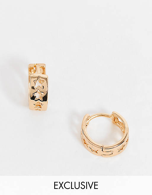 Reclaimed Vintage inspired cut out star huggie hoop earrings in gold
