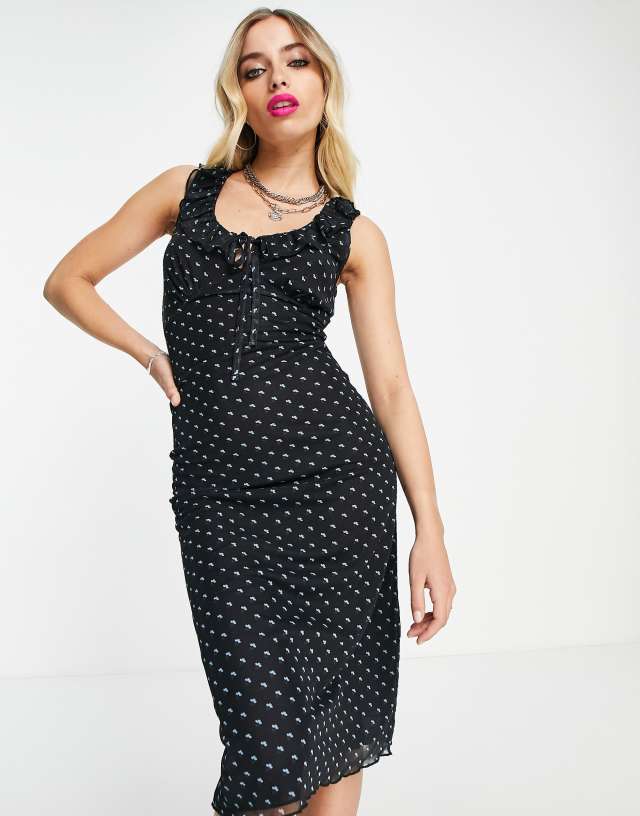 Reclaimed Vintage inspired ditsy print midi dress in black