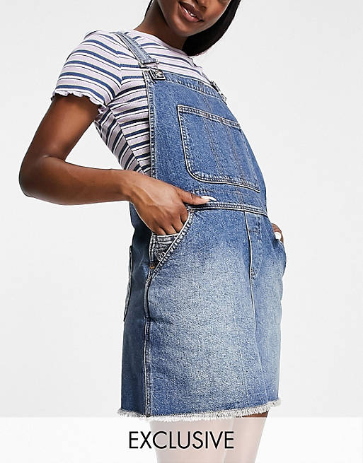 Reclaimed Vintage inspired dungaree denim mini skirt in authentic blue wash