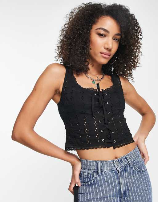 Reclaimed Vintage Inspired eyelet cami top with lace up detail in black ...