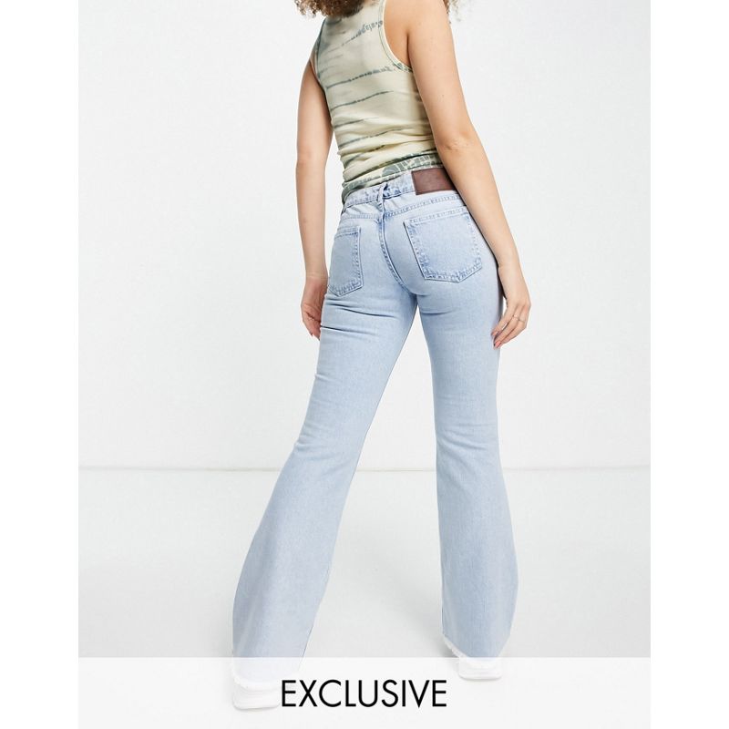 Reclaimed Vintage Inspired - Jeans a zampa a vita bassa lavaggio candeggiato sostenibile stile anni '90