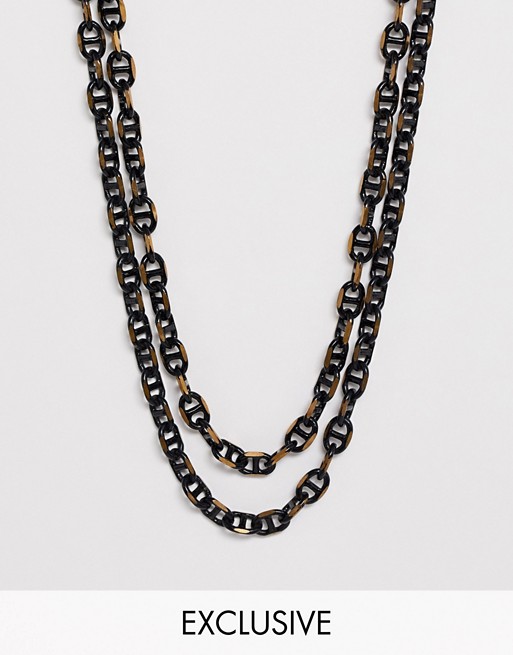 Reclaimed Vintage inspired layered chain interest in black and gold exclusive to ASOS