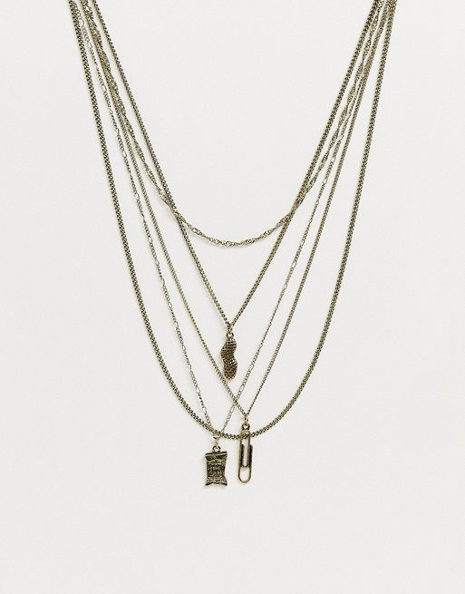 Reclaimed Vintage inspired layered neckchain with 90's charm interest in burnished gold exclusive to ASOS