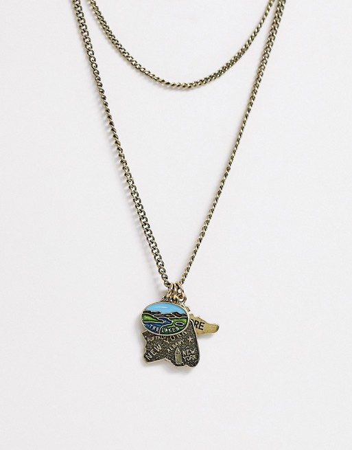 Reclaimed Vintage inspired layered neckchain with vintage souvenir charms exclusive to ASOS