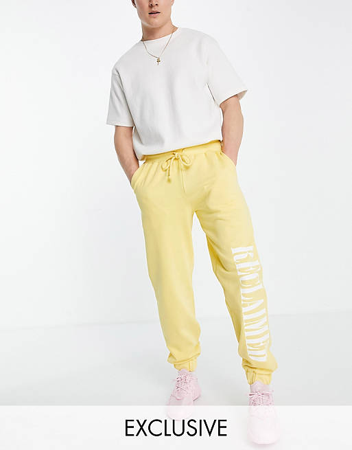 Reclaimed Vintage inspired logo joggers in yellow