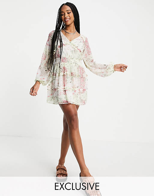 Reclaimed Vintage inspired mini dress with ruffle detail in spliced floral print