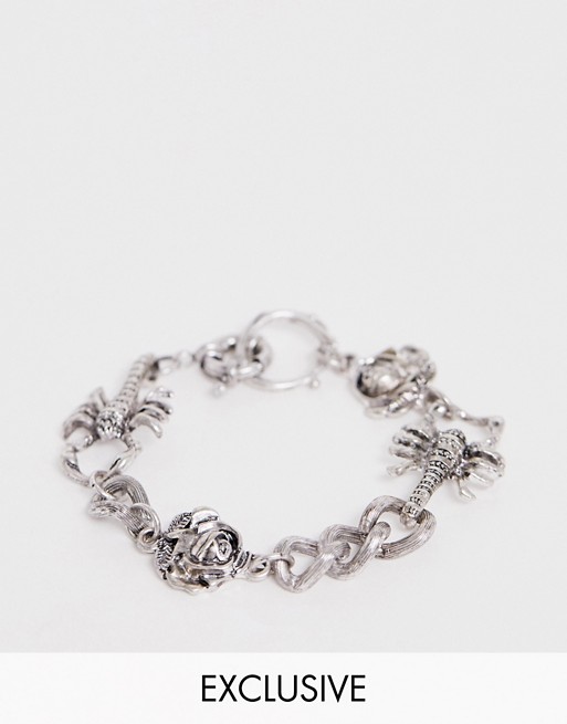 Reclaimed Vintage inspired mixed charm bracelet in silver exclusive to ASOS