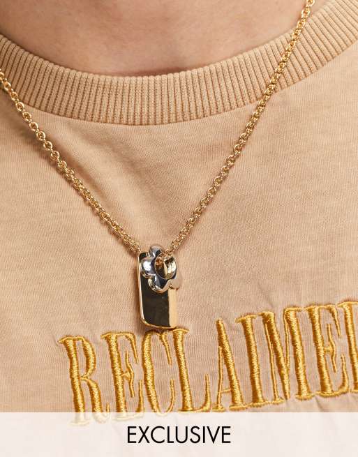 Reclaimed Vintage Inspired necklace with tag and flower pendants in mixed metal