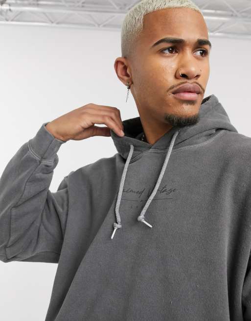 Reclaimed Vintage inspired oversized overdyed hoodie with logo in charcoal