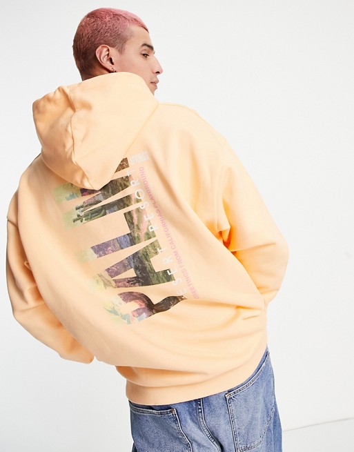 Reclaimed Vintage inspired Palm print hoodie in orange
