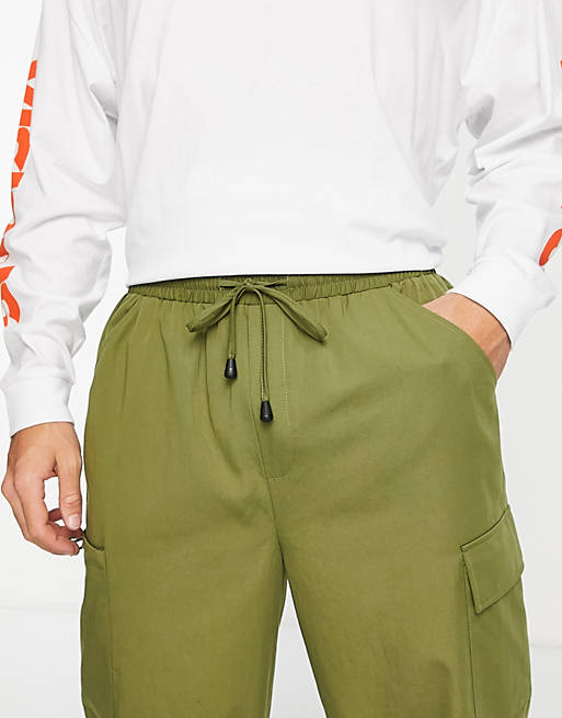 pantaloncini cargo con vita elasticizzata kaki da Uomo di Reclaimed Inspired Uomo Abbigliamento da Shorts da Shorts cargo multitasche vintage in Verde 