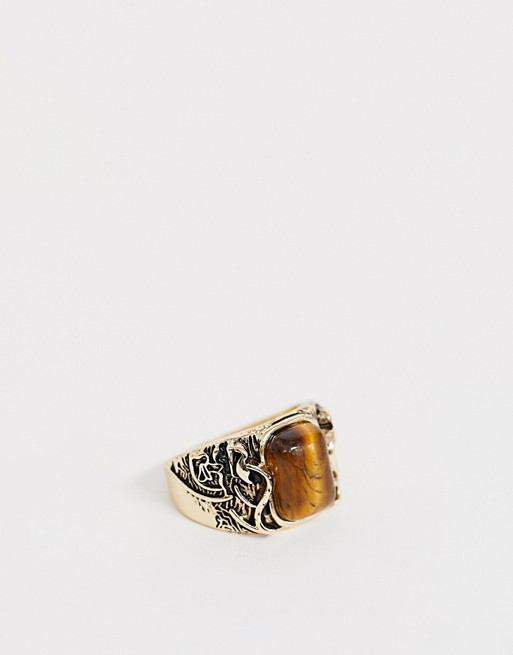 Reclaimed Vintage inspired ring with emboss detail and semi precious stone detail in gold tone exclusive to ASOS
