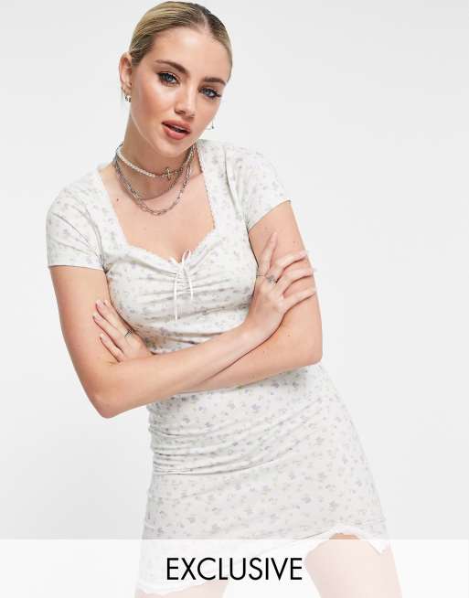 Reclaimed Vintage Inspired - Robe courte en jersey à nœud et imprimé petites fleurs