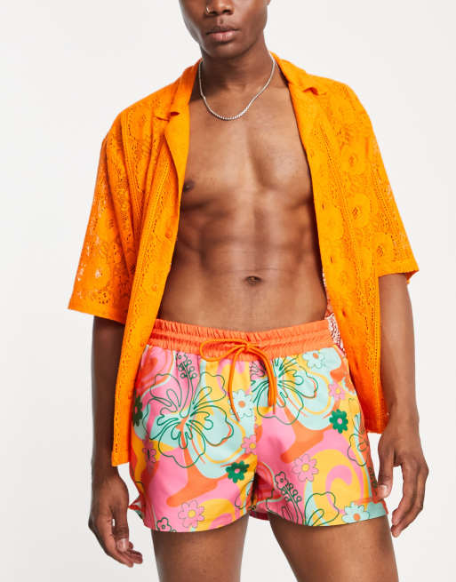 Reclaimed Vintage Inspired runner swim shorts in retro floral print 