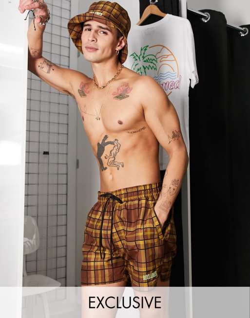 Reclaimed Vintage Inspired shorter length swim shorts in grunge check - MULTI