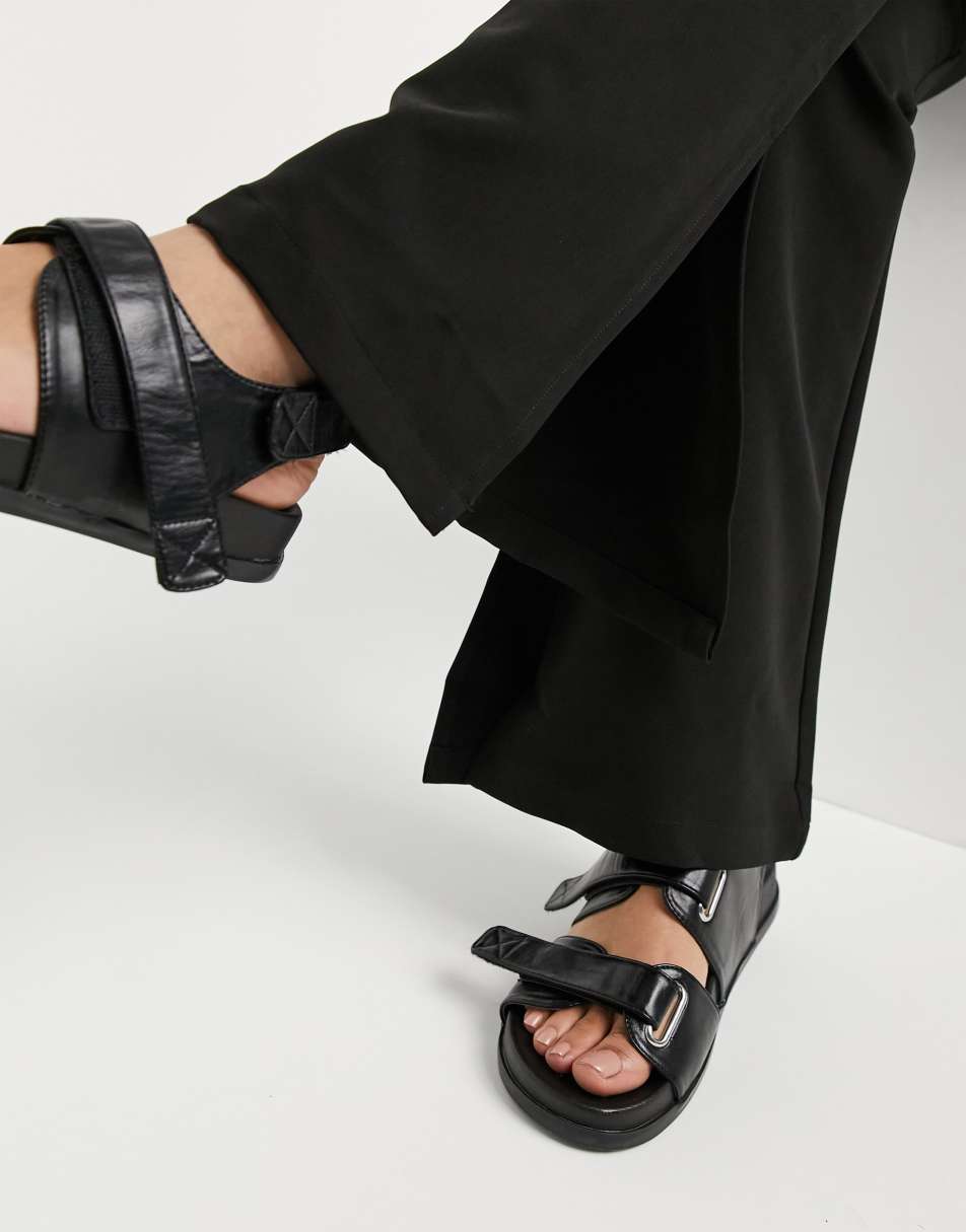 Reclaimed Vintage inspired slim flare trouser in black 1