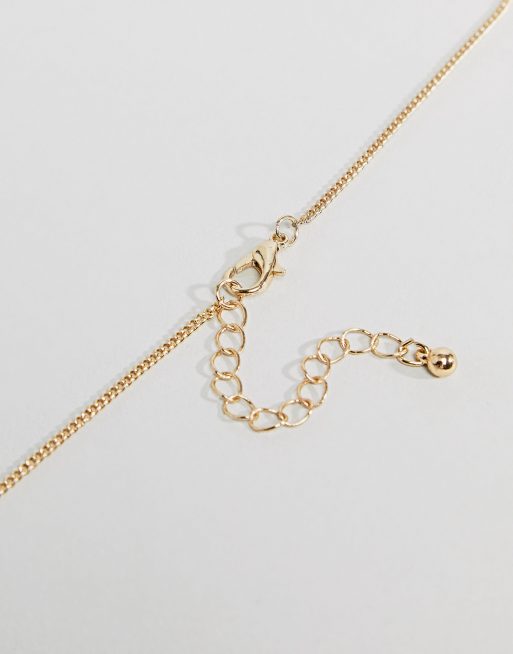 Reclaimed Vintage inspired St Christopher necklace in gold exclusive at ASOS