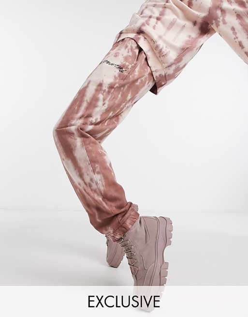 Reclaimed Vintage inspired sweatpants in tie-dye wash in rust | ASOS